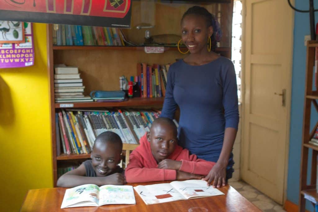 Nora in library with students